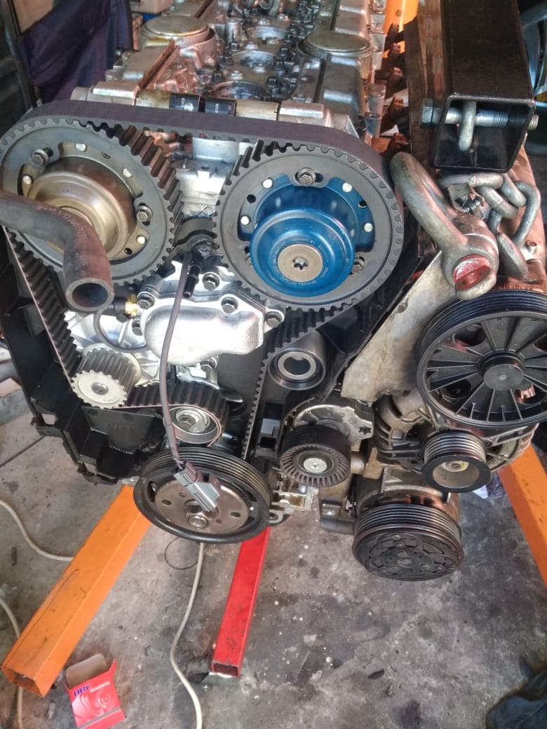 Mobile mechanic performing an on-site engine repair in Cape Town
